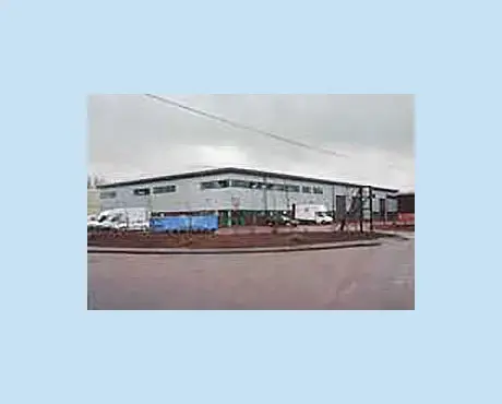 The artist’s impression and completed project at Mead Industrial Park
